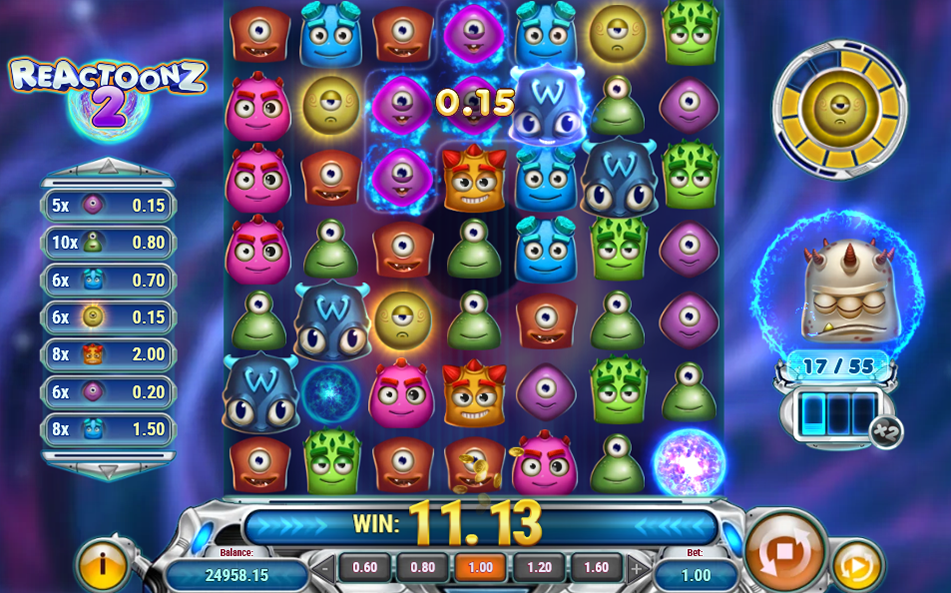 Reactoonz 2 gameplay showing Uncharged and Electric Wilds spread across the grid