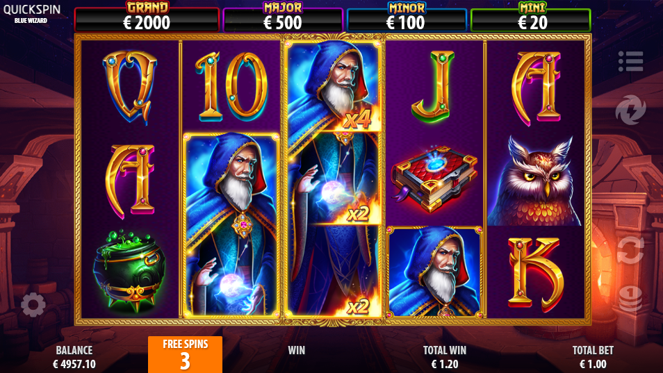 Free spins, reel 3 shows three wizard wilds carrying x4, x2 and x2 multipliers.