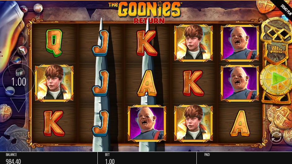 Goonies Return base reels with tall silver spike symbols filling reels two and three in place of standard symbols.