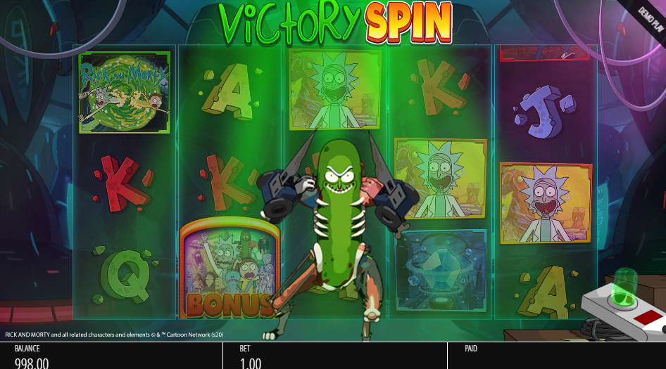 Pickle Rick armed with laser cannons standing on the reels under a Victory Spin banner.
