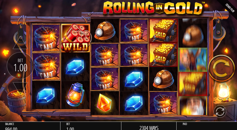 Base game with multiple lit TNT charges across the reels before the Mystery Symbol flip