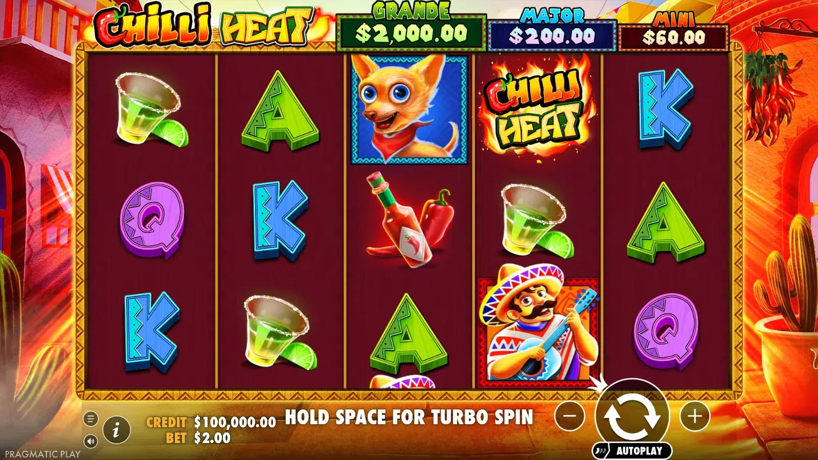 Chilli Heat reels at rest with the Grande, Major and Mini jackpot banners above them