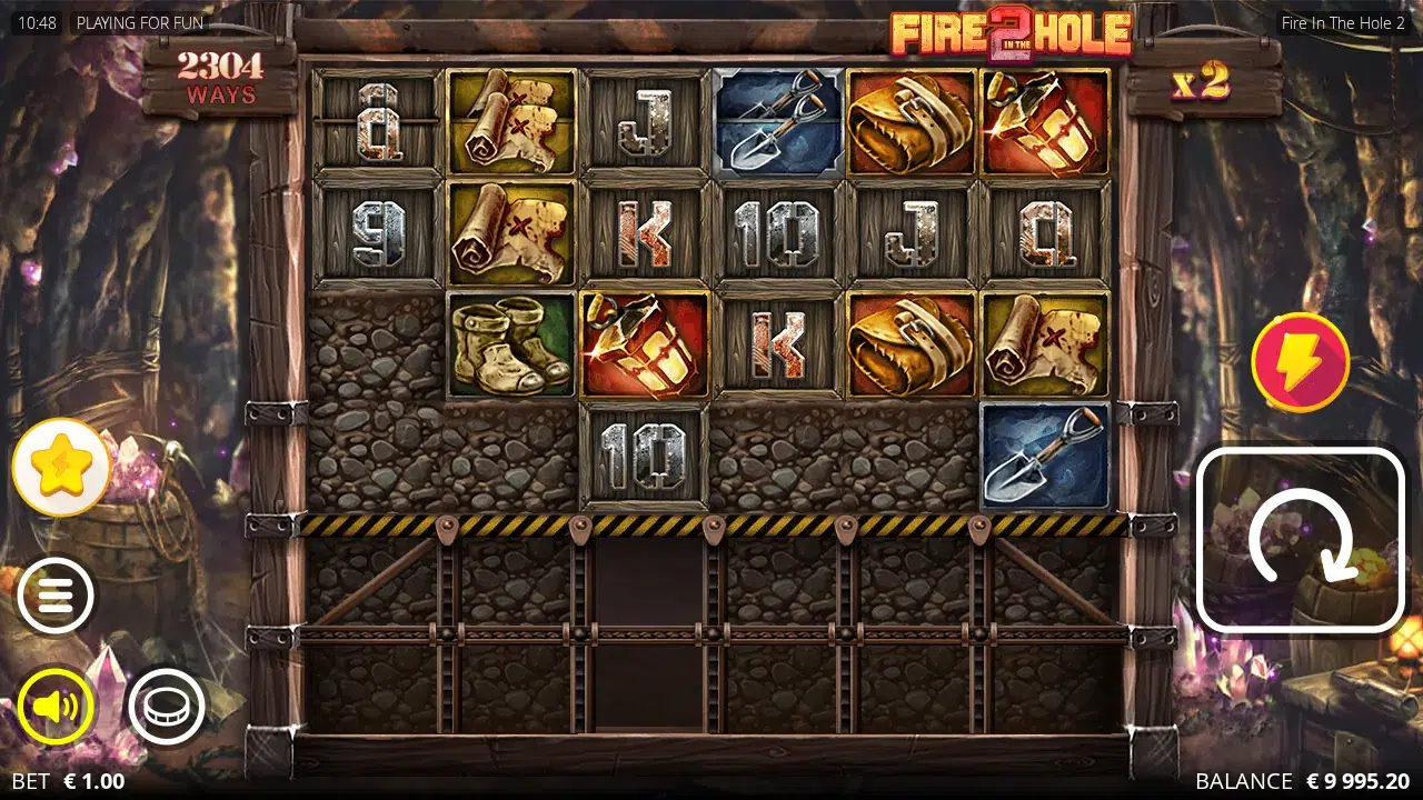 Fire in the Hole 2 reels mid-collapse with a fourth row open, 2304 ways showing and an x2 multiplier lit