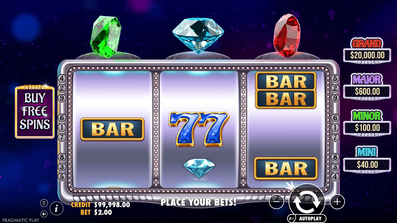 Gem Trio 3x3 reels with emerald, diamond and ruby gems above and the jackpot plaques beside them