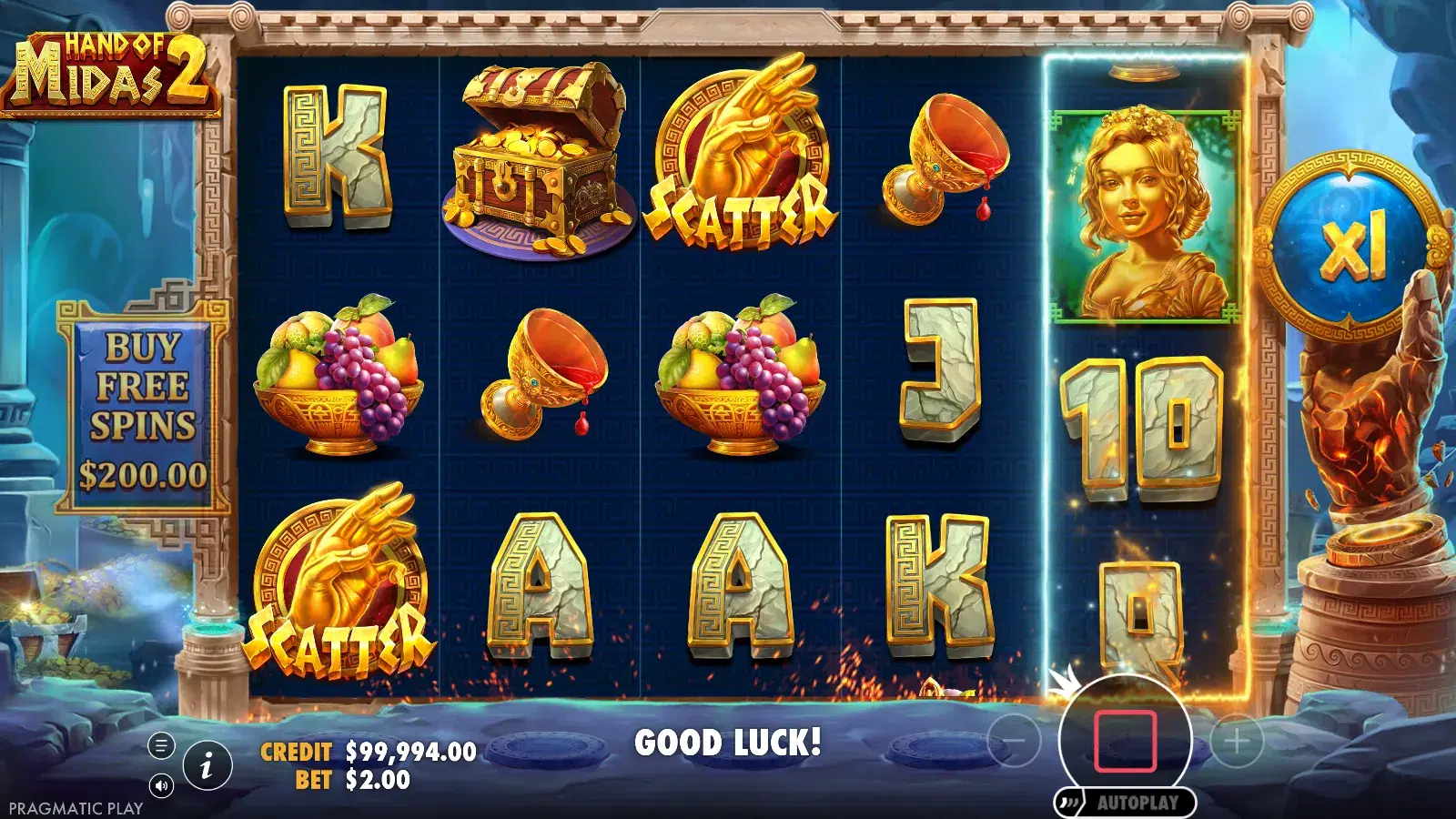 Hand of Midas 2 mid-spin with scatters on reels 1 and 3 and reel 5 still moving