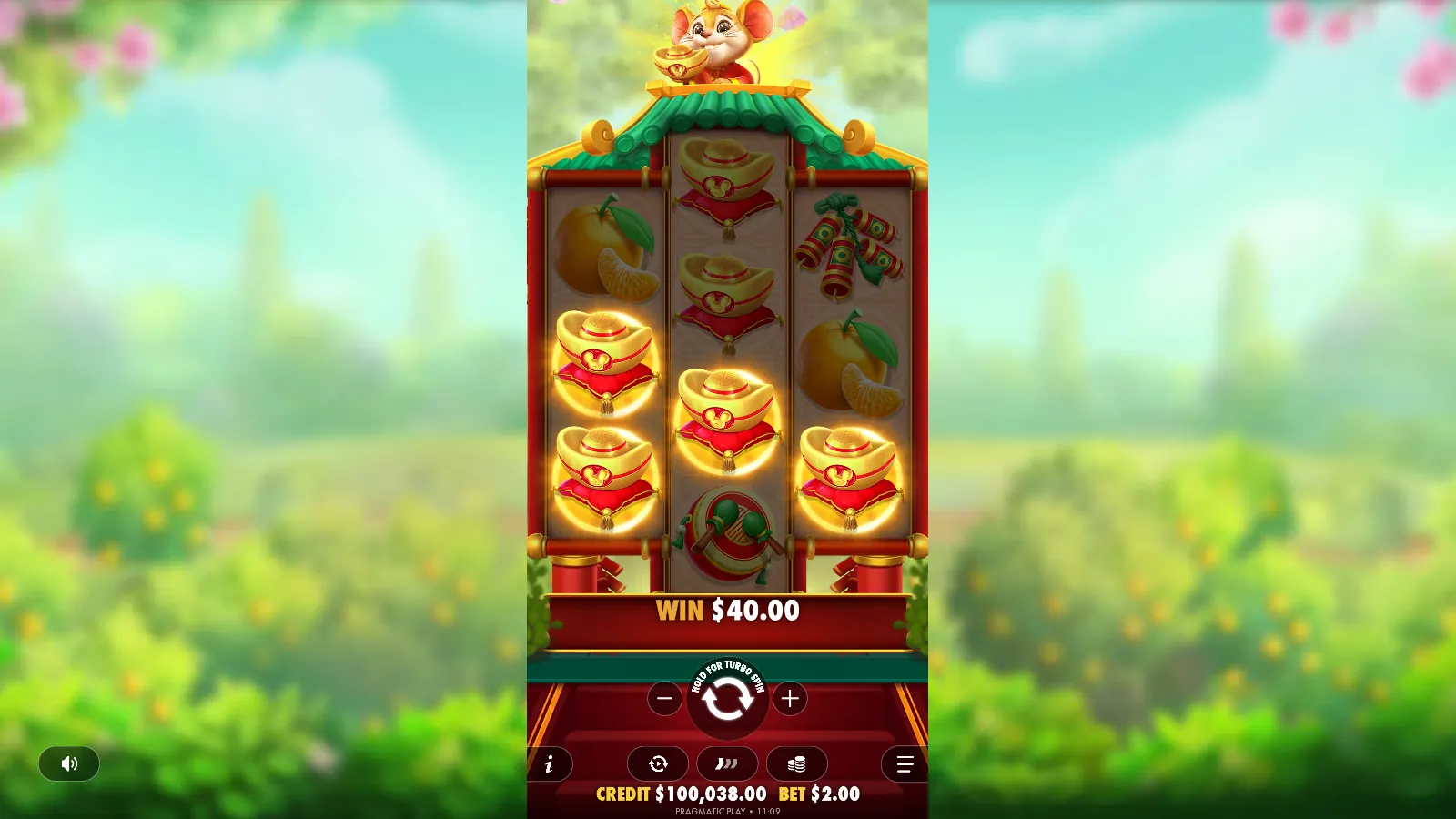 Ratinho Sortudo reels with gold ingots lit across all three reels after a winning spin