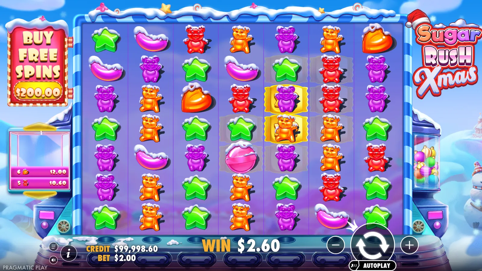 Sugar Rush Xmas board with two gold multiplier spots on reel 5 and grey marks nearby, win $2.60