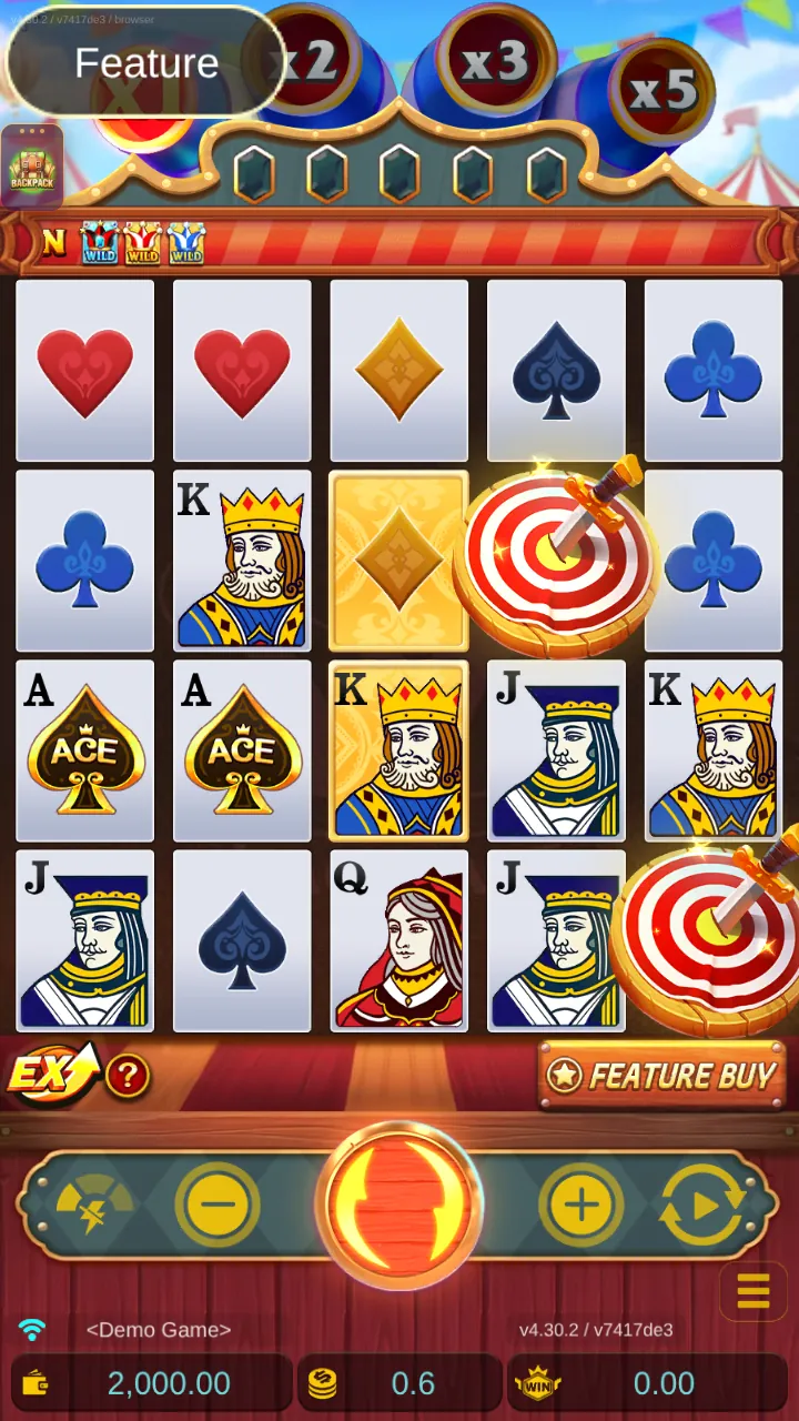 Magic Ace reels: 5x4 grid of playing cards with two golden cards on reel 3 and two target scatters under the circus cannons